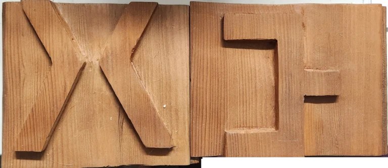 carved wooden symbols