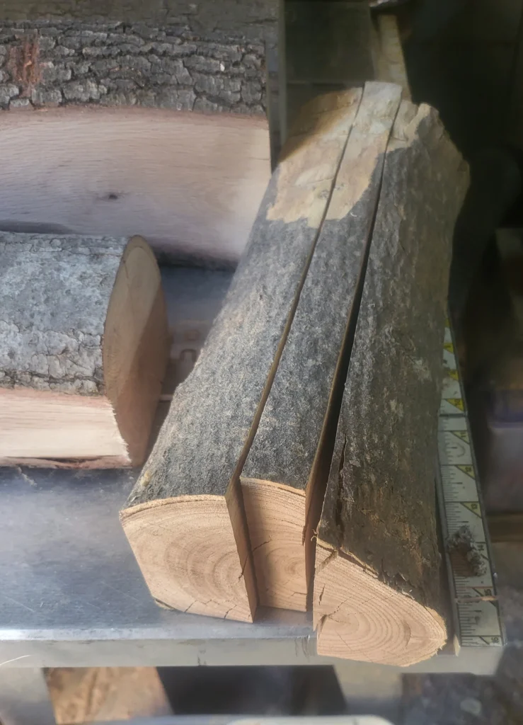 wooden log cut into boards