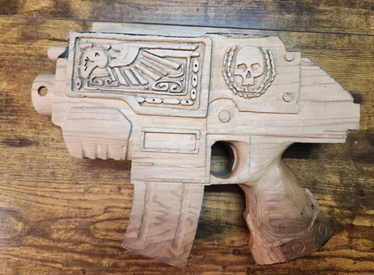 hand carved Warhammer 40k bolter pistol