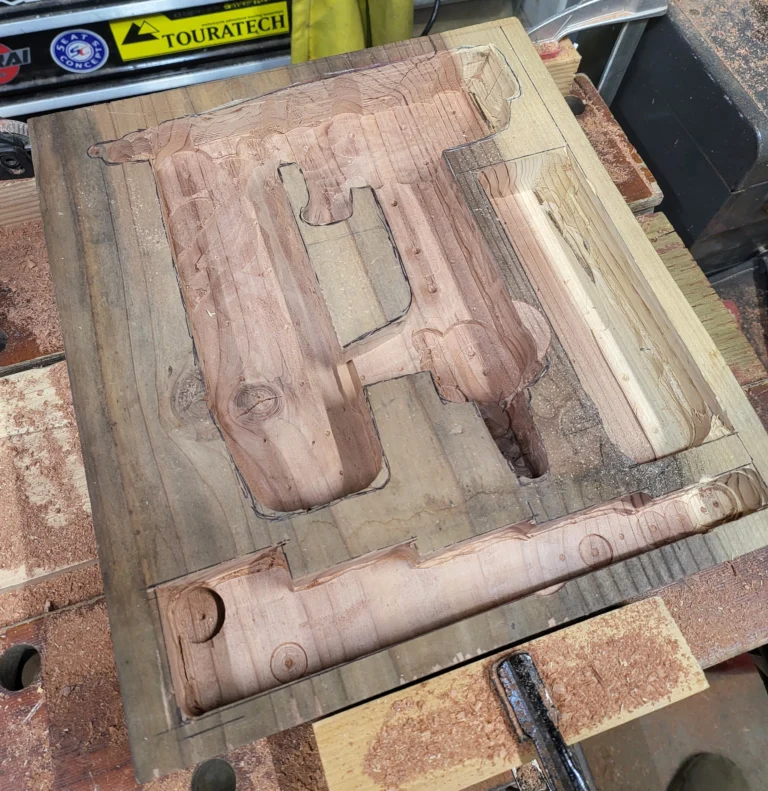 wooden box carved to fit nail gun
