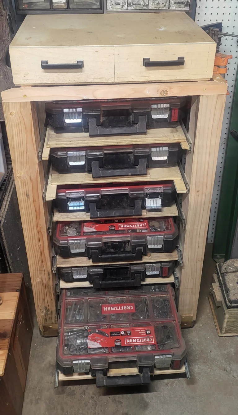 wooden shelves slid open with tool boxes